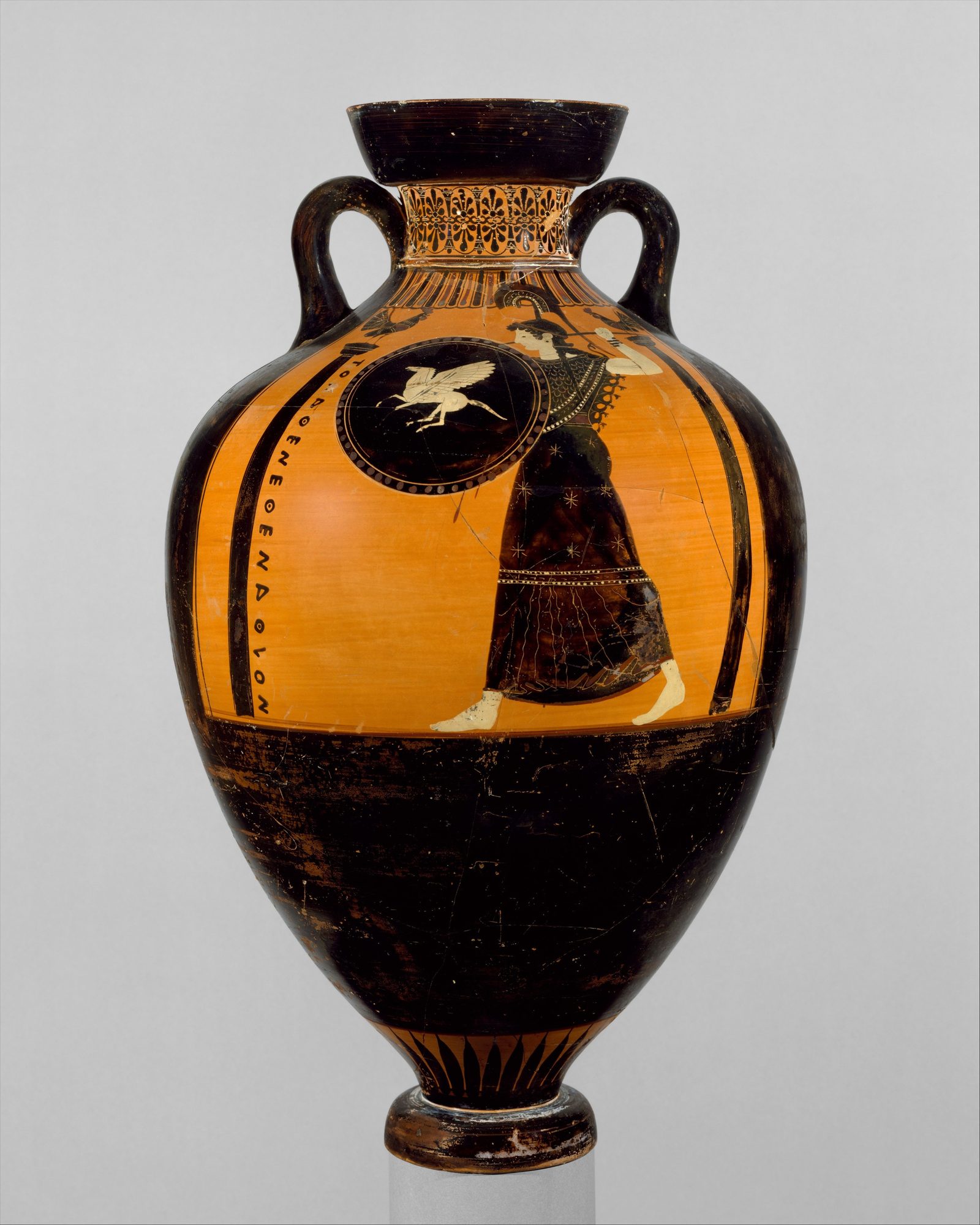 A black-figure Panathenaic prize amphora: the goddess Athena Promachos strides to the left between two columns, helmeted, brandishing a spear and holding a round shield, her aegis across her chest.