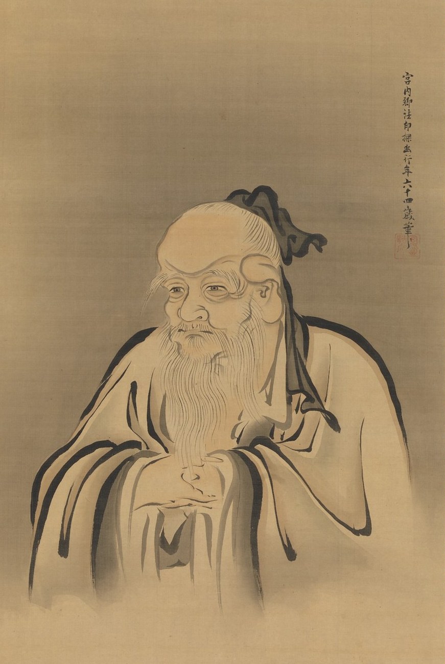 Ink-and-colour portrait of Shennong as a serene white-bearded elder-sage seated with his hands clasped, wild hair bound in a topknot, in a loose pale robe against a plain silk ground, with a brushed inscription and a red seal at upper right.