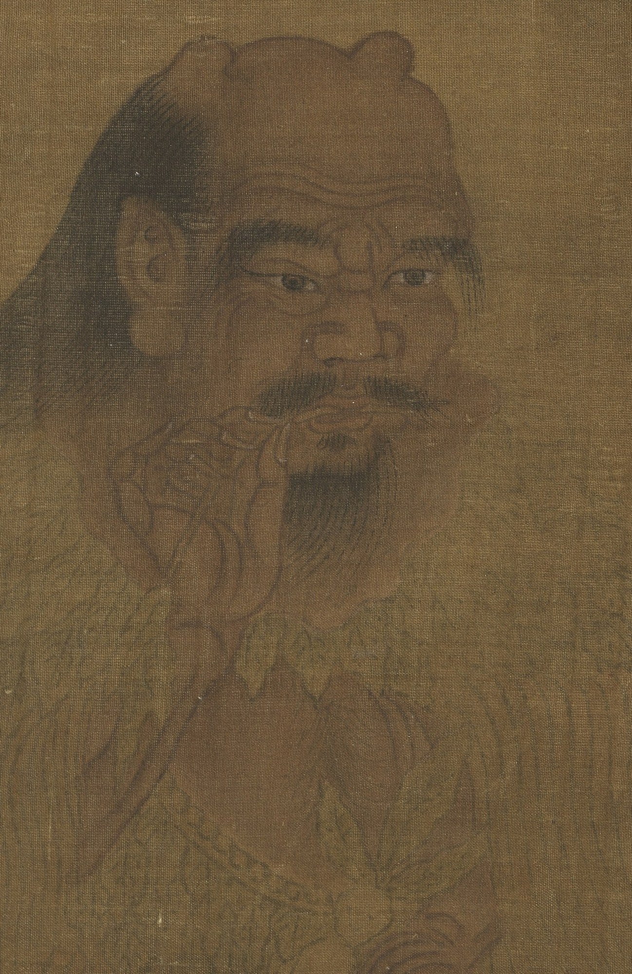 Album-leaf ink portrait on tan silk of the Flame Emperor Shennong as a half-length elder — a broad, wild-eyed bearded face beneath long loose hair, two fleshy horn-like protrusions rising from the crown (the ox-headed 人身牛首 iconography of Yandi), his shoulders clad in a sketchily drawn leaf-and-hide garment; near-monochrome brown line-drawing with no background.